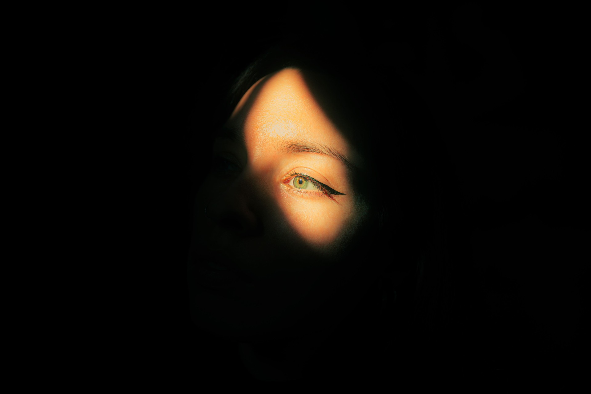 Artistic Portrait Shadow and Light on a Woman’s Face