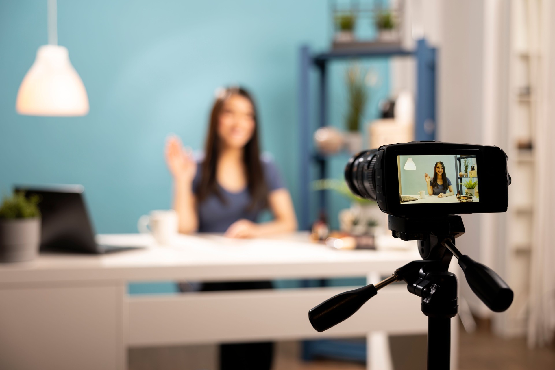 Content creator using camera on a tripod